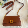Brown shoulder bag with sling belt